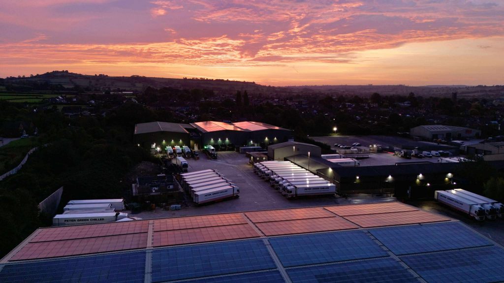 Peter Green Chilled warehouse and vehicles at sunset.
